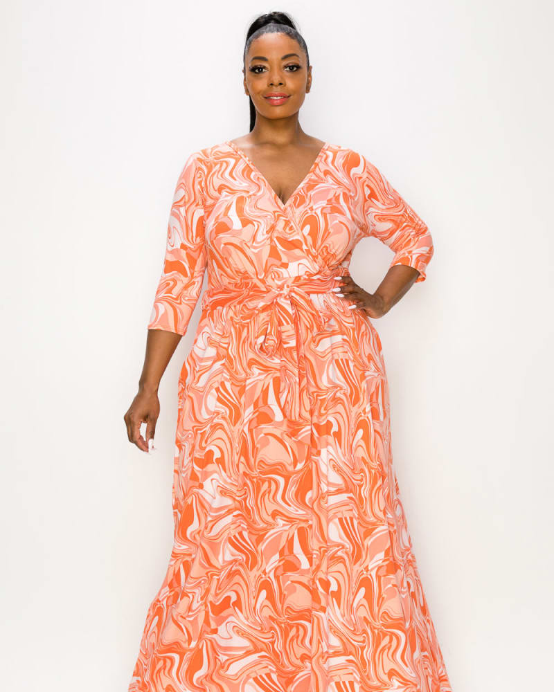 Front of a model wearing a size 1X Hayden Marble Wrap Dress in Coral by L I V D. | dia_product_style_image_id:240831